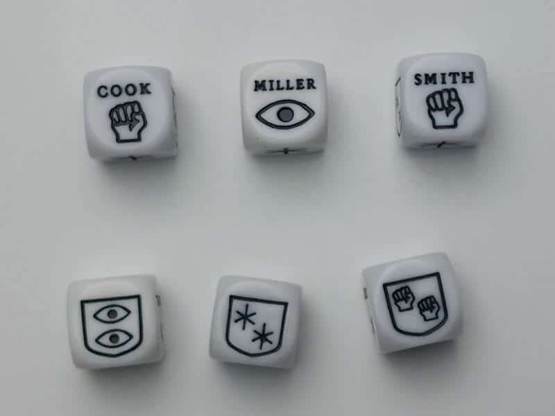 6 dés montrant différentes faces avec des symboles simples ou doubles